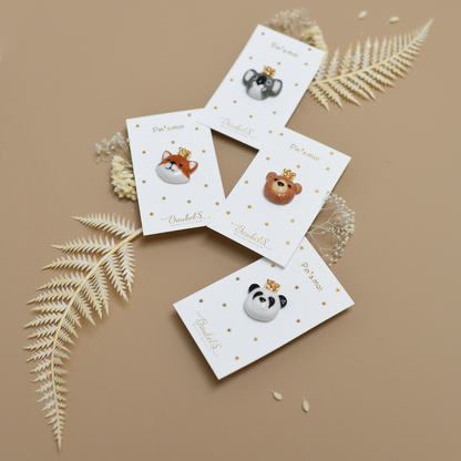 Photo de plusieurs pins ou broches de la collection animaux, de la marque Baubels.